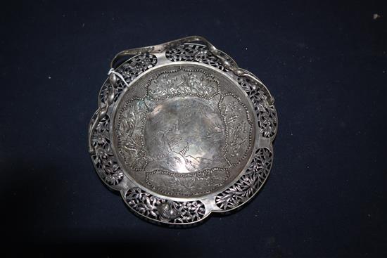 A Chinese white metal shallow basket with pierced border, diameter 18.5cm.